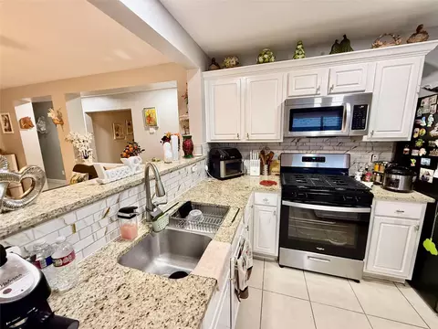 Kitchen - 22843 Twisting Pine Dr, Spring, TX 77373 photo 3 of 4