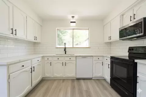 Kitchen - 6023 Knotty Post Ln, Spring, TX 77373 photo 2 of 2