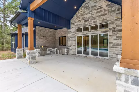 Exterior - 15646 Forest Grove Dr, Willis, TX 77378 photo 8 of 12