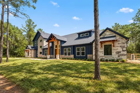 Exterior - 15646 Forest Grove Dr, Willis, TX 77378 photo 2 of 12