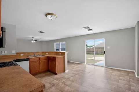 Living - 314 Falling Pine Dr, Conroe, TX 77304 photo 12 of 13
