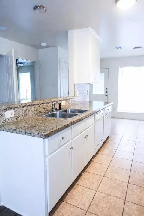 Kitchen - 722 N Sharp St, Franklin, TX 77856 photo 2 of 2