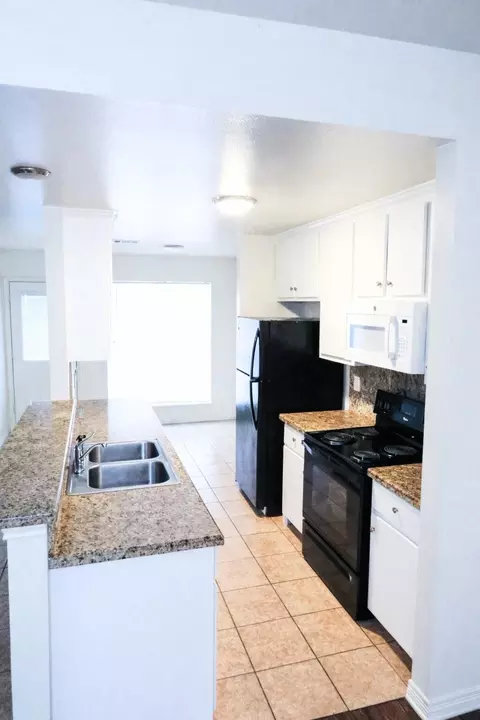 Kitchen - 722 N Sharp St, Franklin, TX 77856 photo 1 of 2