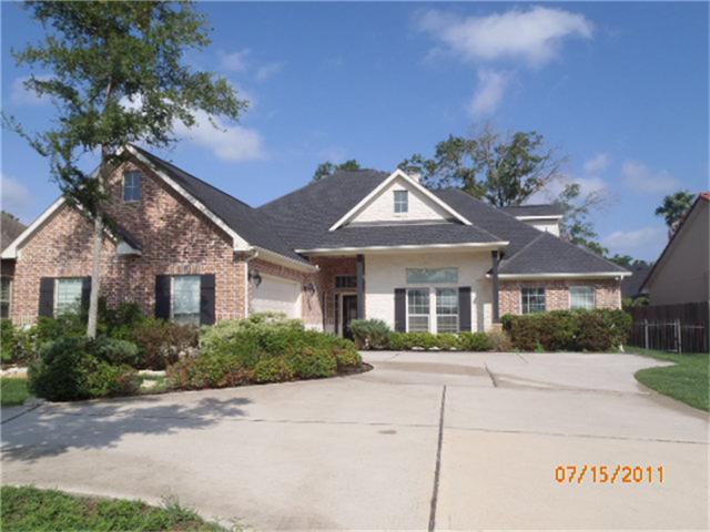 909 Sandy Beach Dr, Conroe, TX 77304 photo 1