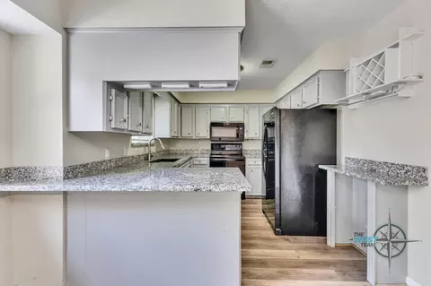 Kitchen - 707 Hildred Ave, Conroe, TX 77303 photo 3 of 4