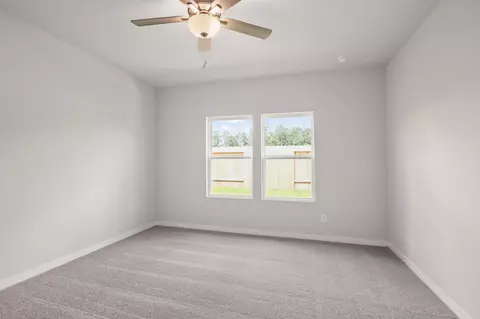 Bedroom - 10778 Red Flagstone Dr, Conroe, TX 77306 photo 1 of 6