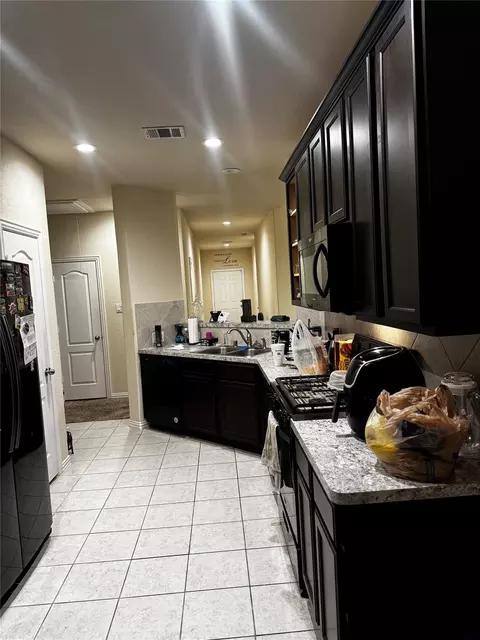 Kitchen - 22739 Highland Maple Ct, Spring, TX 77373 photo 3 of 4