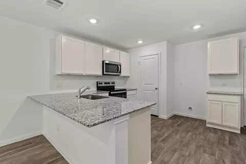 Kitchen - 11938 Detar Ct, Willis, TX 77378 photo 2 of 3