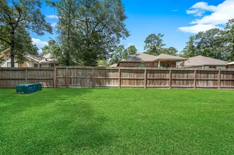 Exterior - 9096 N Comanche Cir, Willis, TX 77378 photo 4 of 5