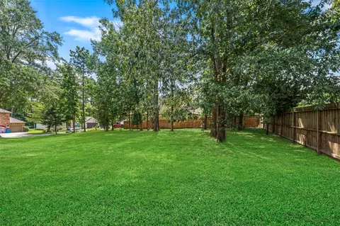 Exterior - 9096 N Comanche Cir, Willis, TX 77378 photo 5 of 5