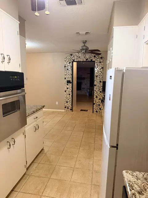 Kitchen - 220 Parkview Dr, Luling, TX 78648 photo 2 of 3