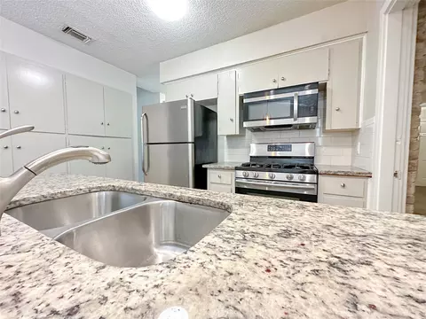 Kitchen - 601 E Covington Dr #A & B, Austin, TX 78753 photo 7 of 10