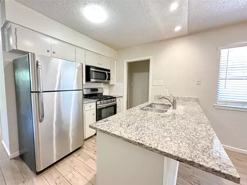 Kitchen - 601 E Covington Dr #A & B, Austin, TX 78753 photo 8 of 10