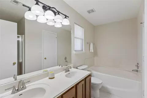 Bath - 104 Cavalry Trl, Elgin, TX 78621 photo 1 of 3