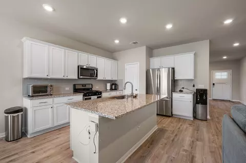Kitchen - 319 Arrowhead Vine St, Leander, TX 78641 photo 2 of 2