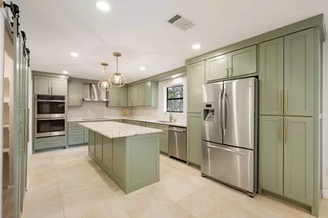 Kitchen - 210 Waxwing Dr, Buda, TX 78610 photo 2 of 6