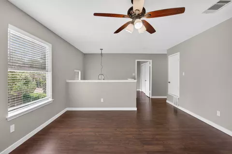 Living - 7601 Windrush Dr, Austin, TX 78729 photo 10 of 12