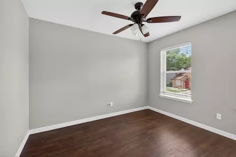 Bedroom - 7601 Windrush Dr, Austin, TX 78729 photo 4 of 7