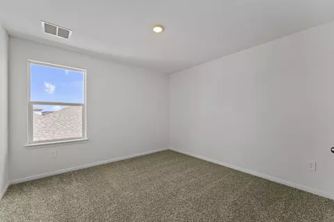 Bedroom - 1836 Side Buster Trl, Georgetown, TX 78628 photo 7 of 12