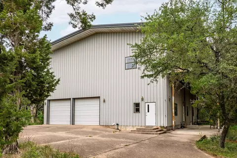 Exterior - 7100 Comanche Trl, Austin, TX 78732 photo 1 of 7