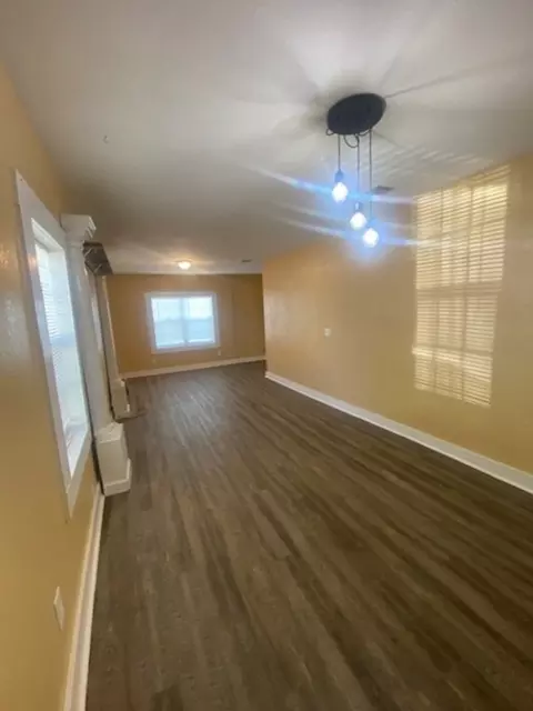 Living - 214 S Hackberry Ave, Luling, TX 78648 photo 4 of 5