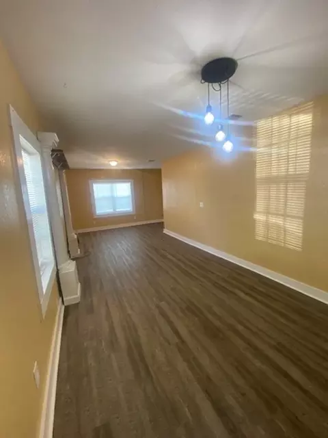 Living - 214 S Hackberry Ave, Luling, TX 78648 photo 4 of 5