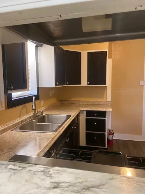 Kitchen - 214 S Hackberry Ave, Luling, TX 78648 photo 1 of 4