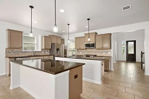 Kitchen - 20416 Shellduck Dr, Pflugerville, TX 78660 photo 5 of 5