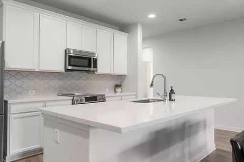 Kitchen - 16601 Sumptuous Dr, Manor, TX 78653 photo 3 of 4