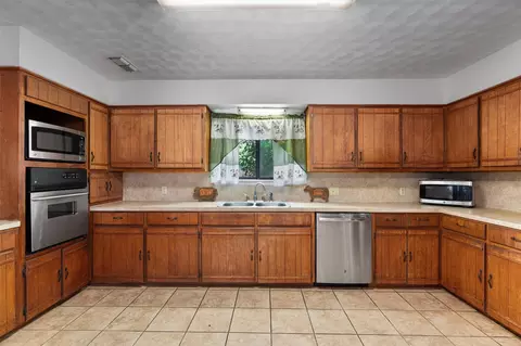Kitchen - 455 Robins Ln, Bertram, TX 78605 photo 2 of 4