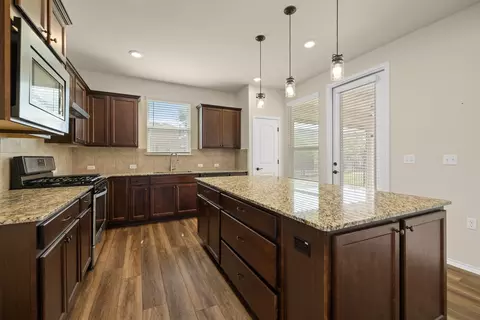 Kitchen - 716 Kitty Hawk Rd, Georgetown, TX 78633 photo 1 of 2