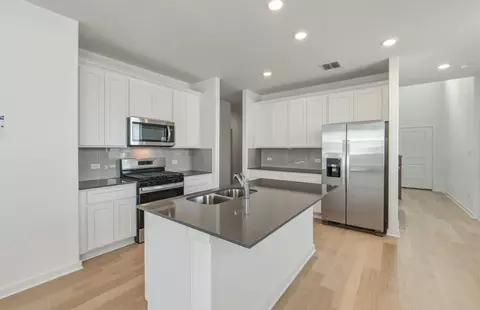Kitchen - 664 Rubber Tree Way, Buda, TX 78610 photo 2 of 2