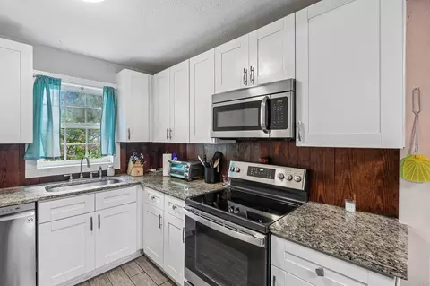 Kitchen - 606 E Pecan St, Taylor, TX 76574 photo 2 of 2