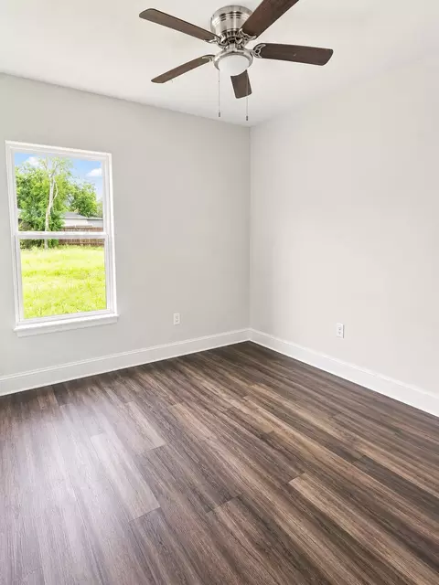 Bedroom - 904 E Austin St, Luling, TX 78648 photo 1 of 2