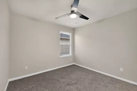 Bedroom - 315 Gladiola Loop, Kyle, TX 78640 photo 11 of 12