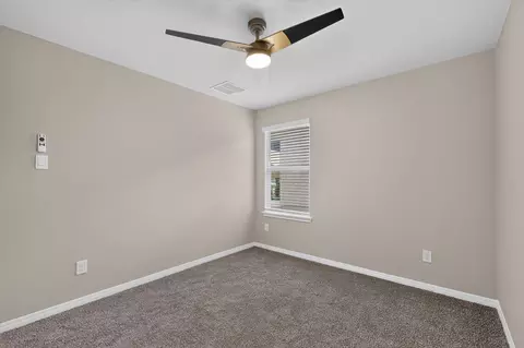 Bedroom - 315 Gladiola Loop, Kyle, TX 78640 photo 5 of 12