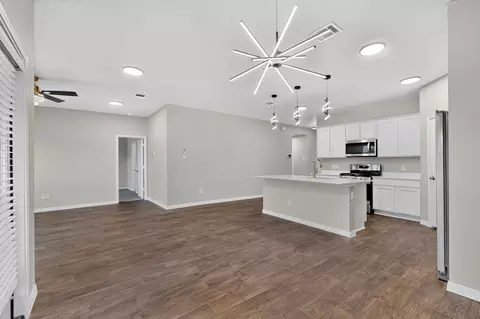 Living - 315 Gladiola Loop, Kyle, TX 78640 photo 5 of 6