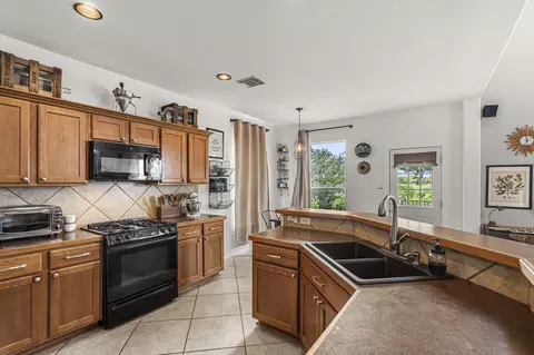 Kitchen - 454 Fall Cir, Kyle, TX 78640 photo 3 of 3