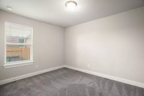 Bedroom - 2209 Hat Bender Loop, Round Rock, TX 78664 photo 6 of 7