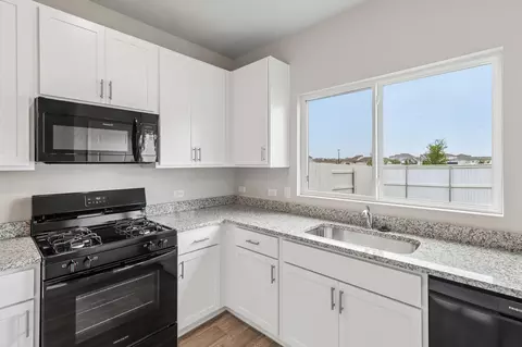 Kitchen - 108 Bountiful Ln, Elgin, TX 78621 photo 3 of 4
