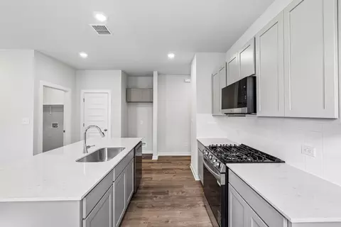 Kitchen - 212 Bendecido Loop, Elgin, TX 78621 photo 2 of 2