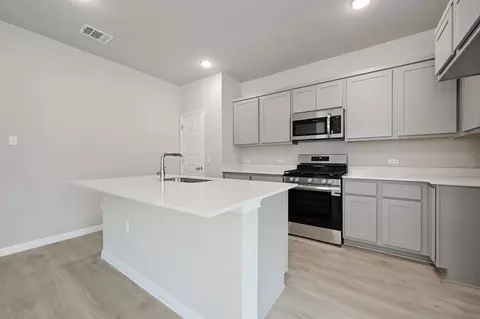 Kitchen - 216 Hornet St, Elgin, TX 78621 photo 2 of 3