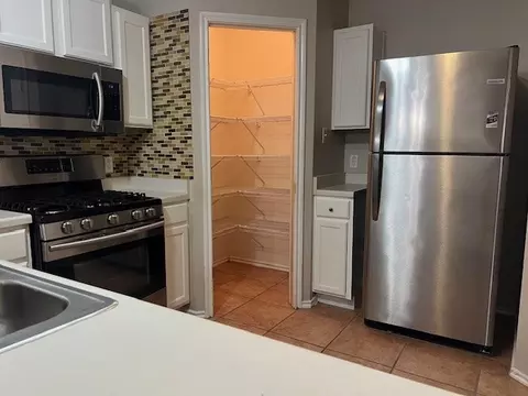 Kitchen - 184 Dandelion Loop, Kyle, TX 78640 photo 2 of 2