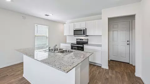 Kitchen - 369 Old Stagecoach Rd, Jarrell, TX 76537 photo 2 of 2