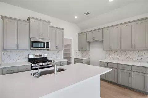 Kitchen - 19509 Erna Dr, Pflugerville, TX 78660 photo 2 of 3