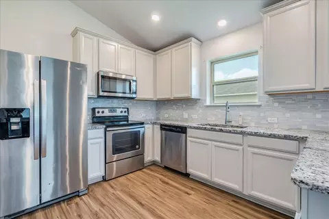 Kitchen - 233 Forest Moon Ln, Kyle, TX 78640 photo 2 of 3