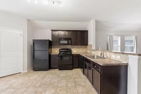 Kitchen - 18420 Cloudmore Ln, Elgin, TX 78621 photo 2 of 2