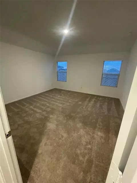 Bedroom - 169 Sormonne Loop, Kyle, TX 78640 photo 2 of 2
