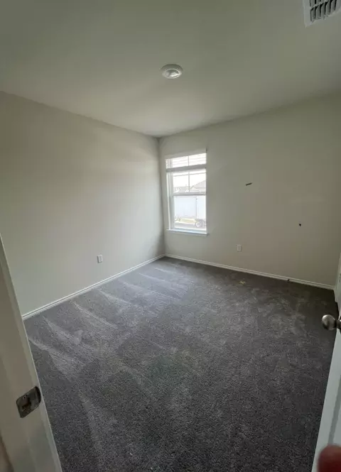 Bedroom - 499 Tree Nut Loop, Buda, TX 78610 photo 3 of 5