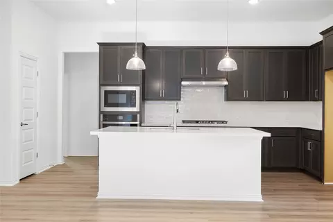 Kitchen - 408 Rubber Tree Way, Buda, TX 78610 photo 3 of 3